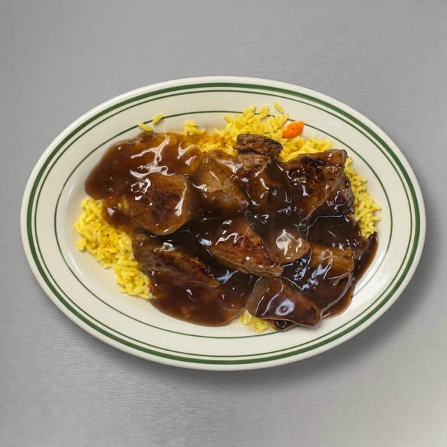 Marinated Beef Tips Over Rice Special.