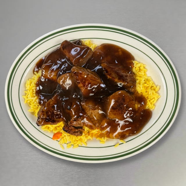 Marinated Beef Tips Over Rice Special.