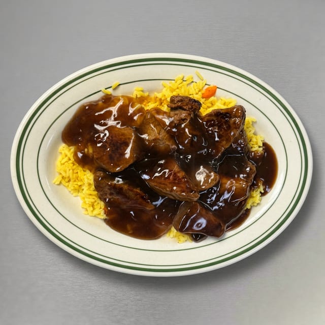 Marinated Beef Tips Over Rice Special.