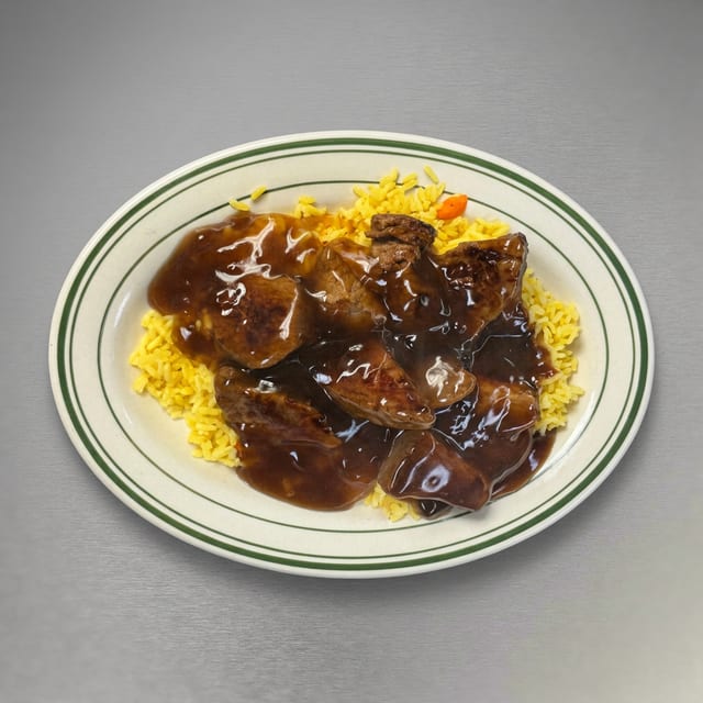 Marinated Beef Tips Over Rice Special.